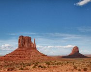 IMG 7697-HDR  We left Canyon de Chelly and drove to Monument Valley, a Navajo Tribal Park.  We shot this photo of The Mittens (West, on the left, and East, on the right) Buttes, one of the icons often associated with the park.