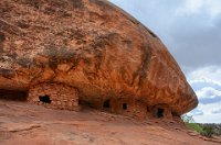 BobsPic-DSC  When the sun comes out, it brings out the color and striations in the rock, making it look like fire eminating from the tops of the structures. Thus, House Rock Ruin.