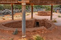 BobsPic-DSC 0122-HDR(3)  The restored kiva.  The base of a tower, thought to be about two stories tall originally, can be seen in the background.  The kiva and the tower are connected by an underground tunnel.