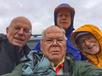 IMG 1209-HDR  We exit the Lexus, put on our rain gear and snap this selfie. l. to r.: BobF, Don, Joe and Ed.  Smile, Don.  You're gonna enjoy this hike.