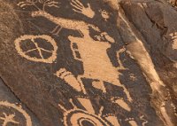 IMG 7479-HDR(3)  Newspaper Rock tells quite a story.  We're just not sure what it is.  That one big creature may represent a chieftain.  But a peace symbol?