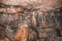 BobsPics-DSC 5700-HDR  Flowstone:  formations formed by water draining down over the area leaving some calcite behind.  Some areas were damp here